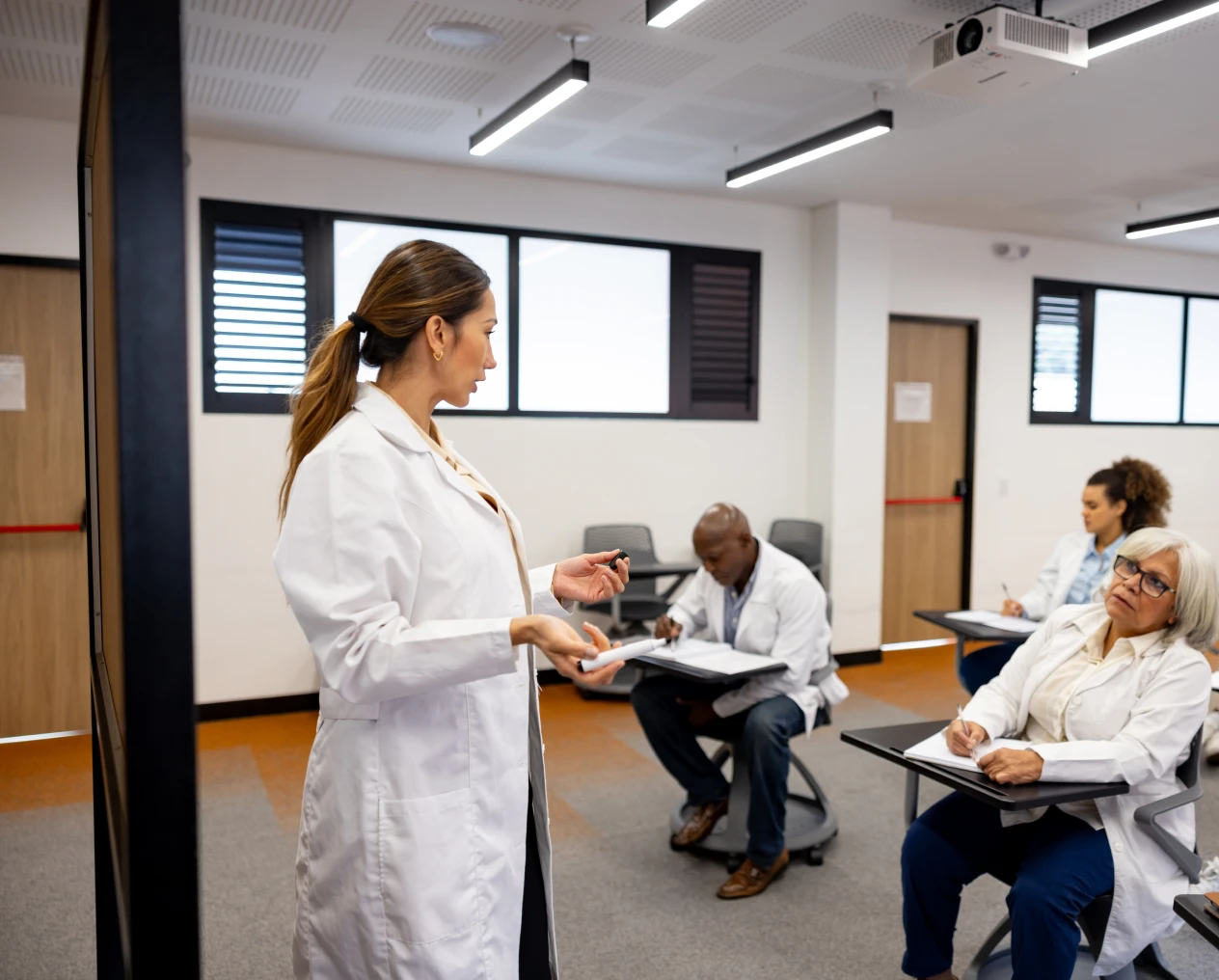 Healthcare professionals attending a lecture